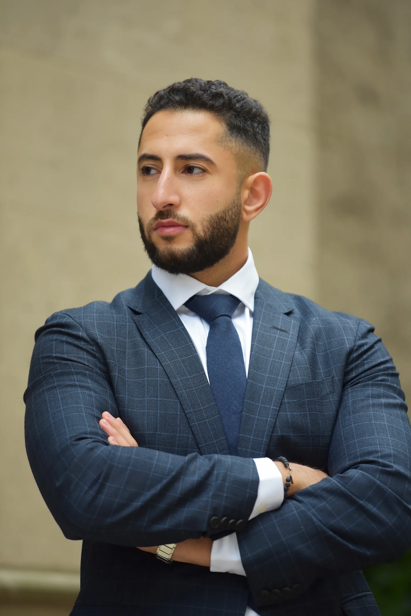 Sharif Maadi, personal injury attorney and founder of Maadi Law, standing with his arms crossed